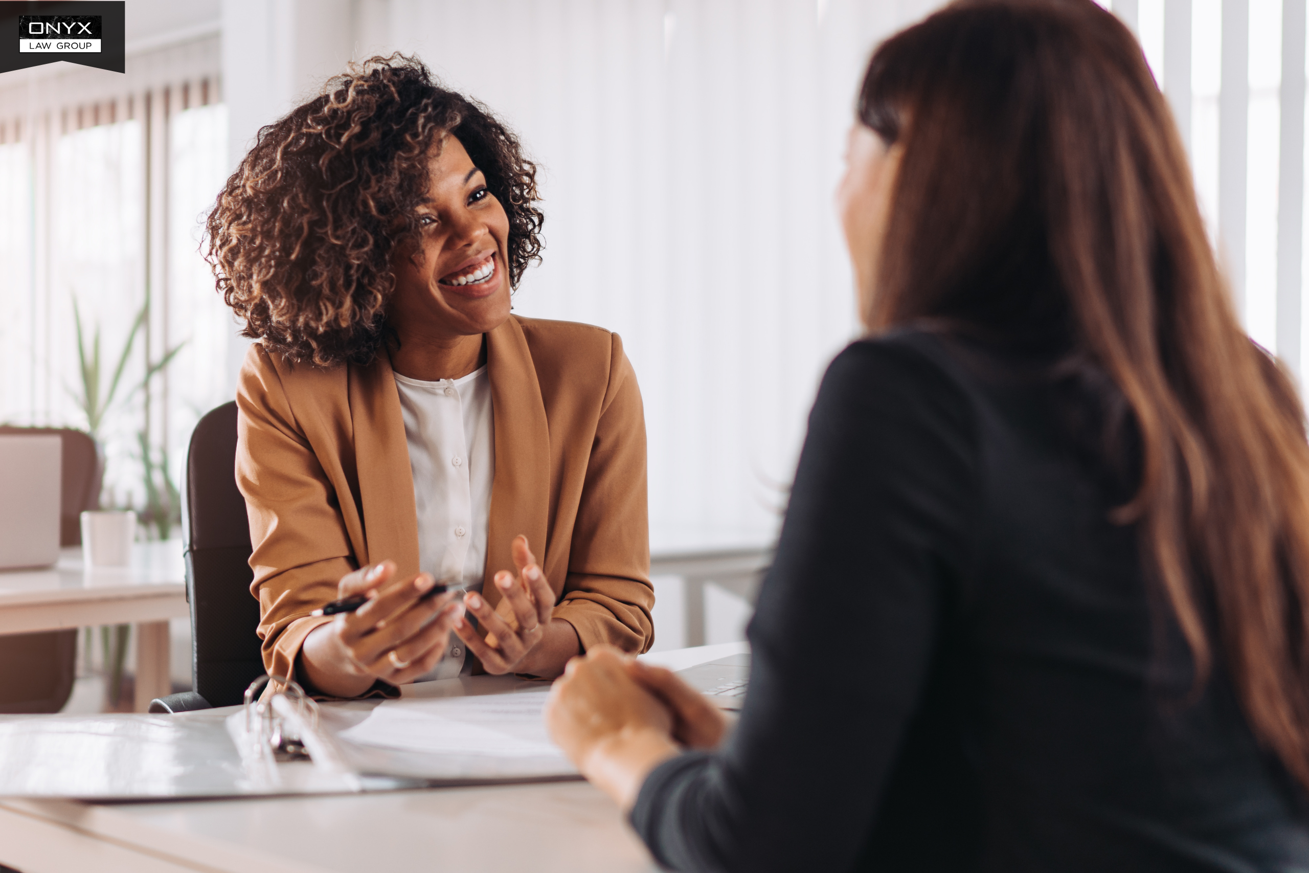 Estate litigation lawyer meeting with a client regarding a will dispute