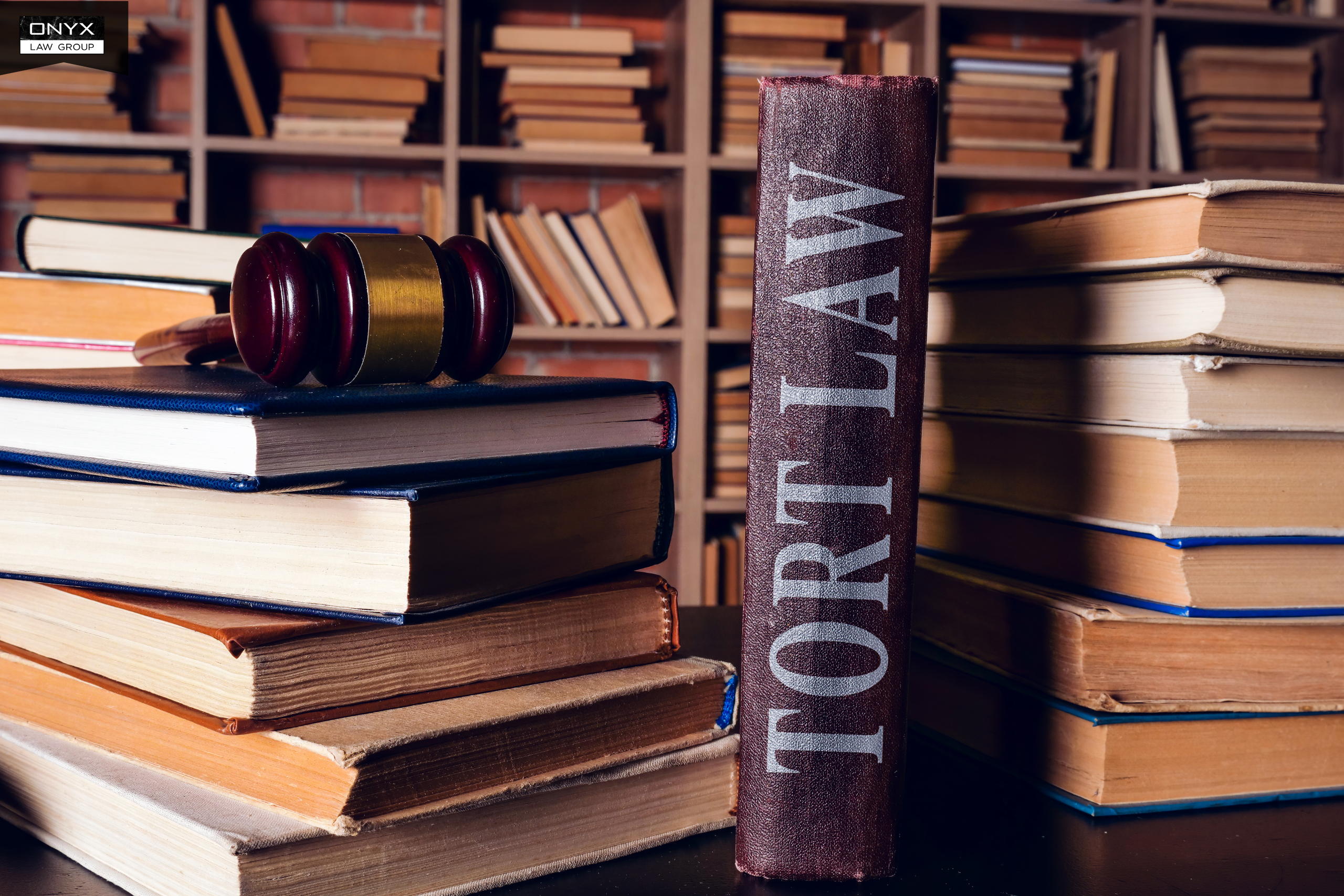 Tort Law Remedies for Family Violence Victims Tort law book and gavel representing legal remedies for victims of family violence in British Columbia