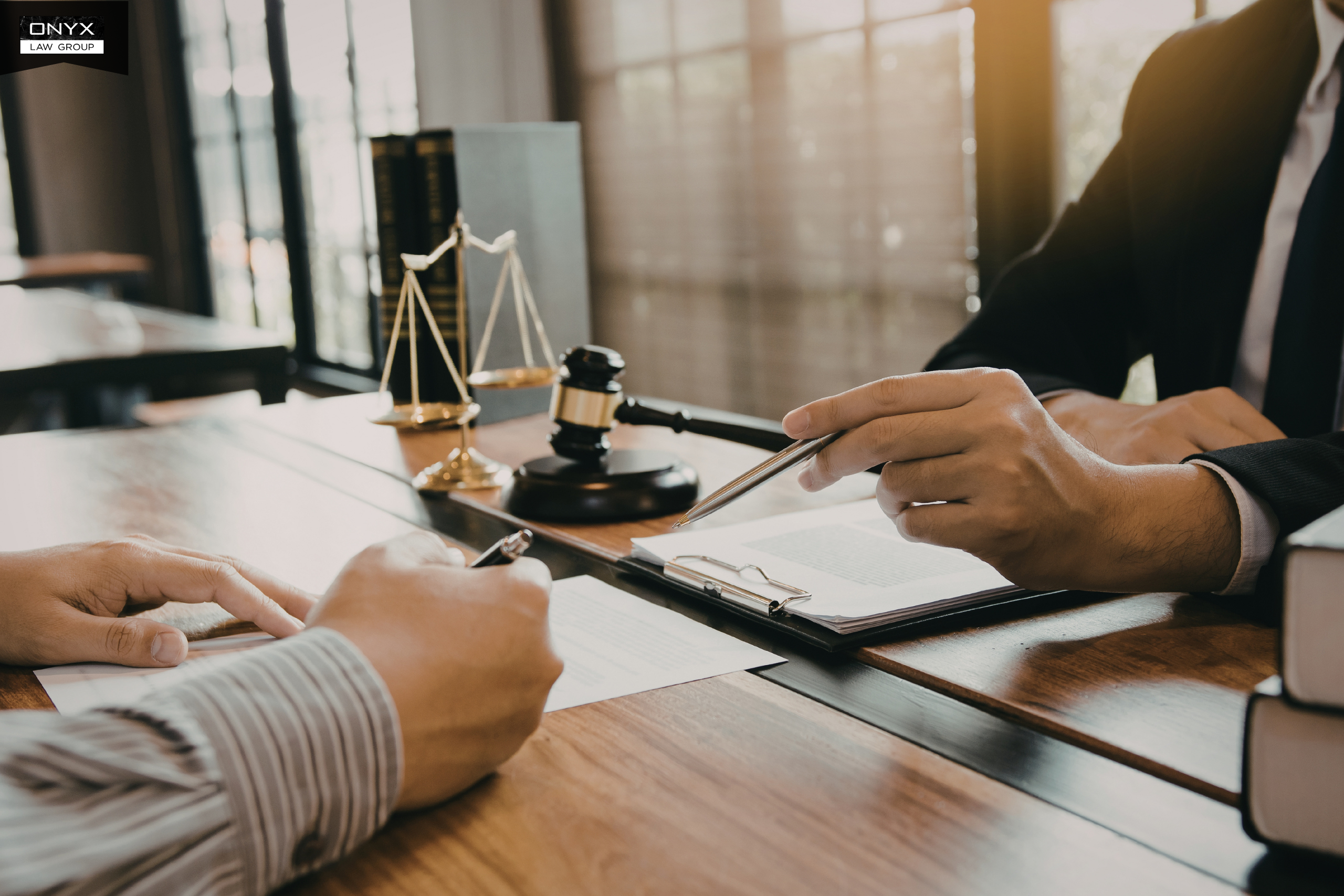 Beneficiaries meeting with a probate lawyer regarding executor issues