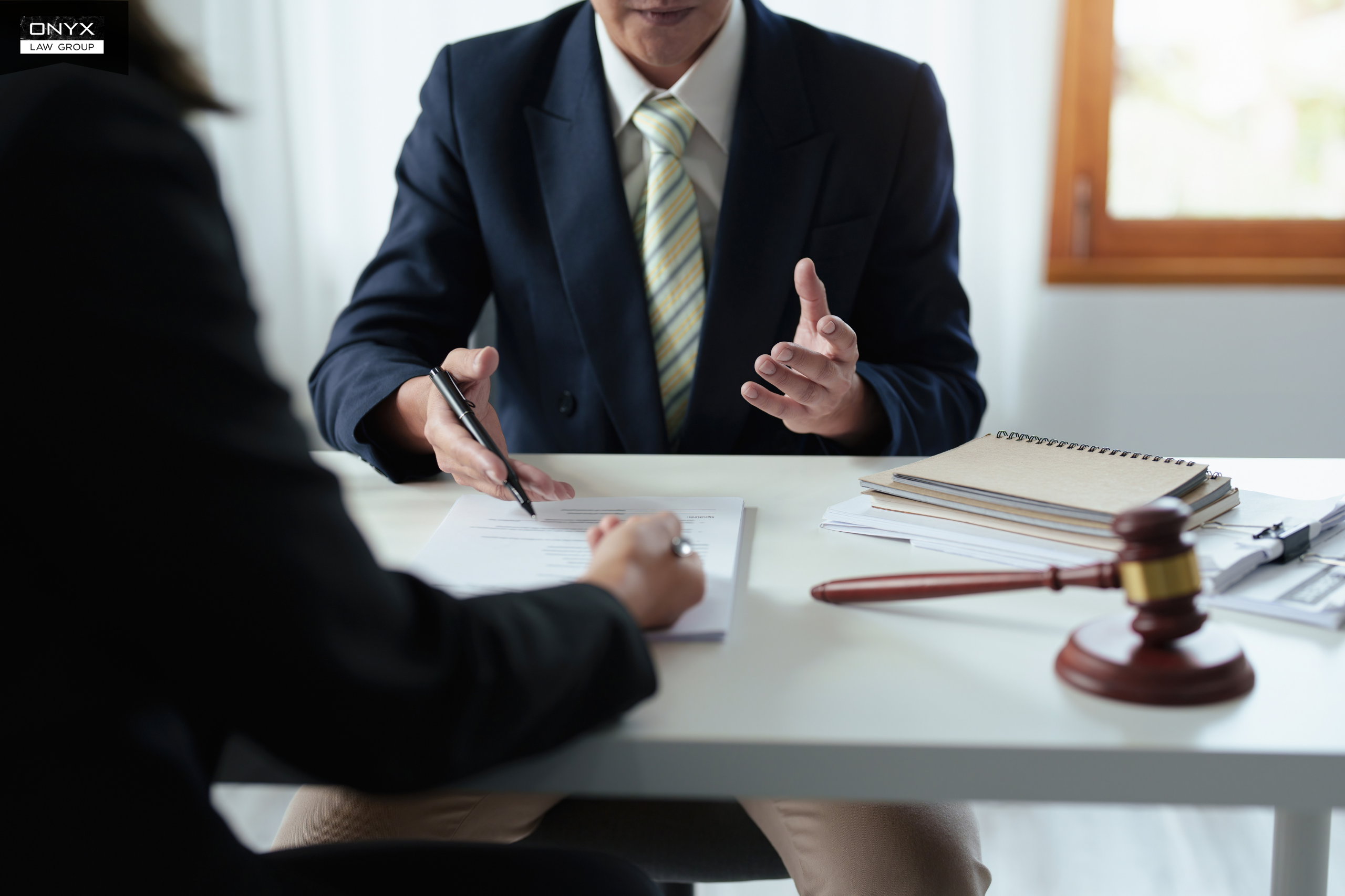 Beneficiaries consulting an estate lawyer about contesting probate